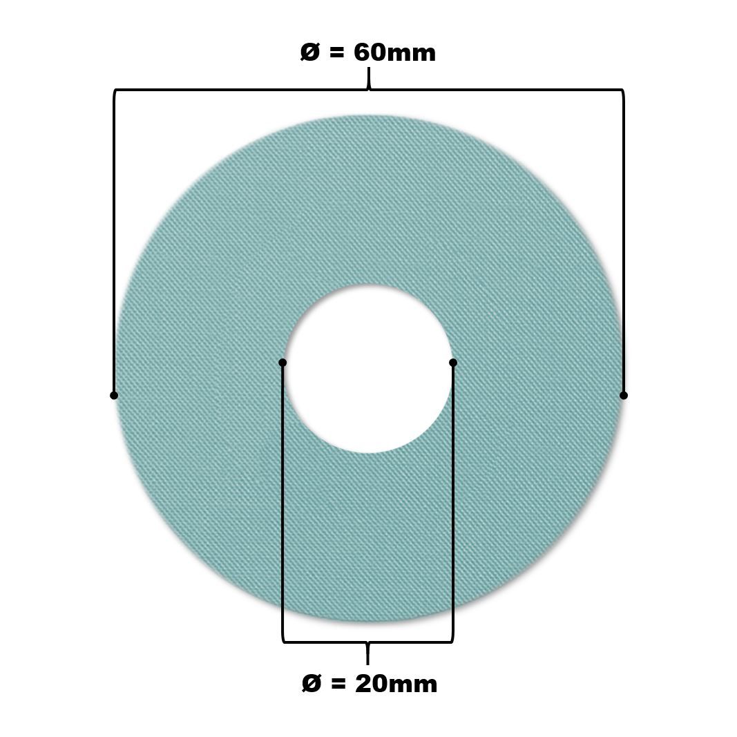 Cerotto per catetere azzurro con foro. Diametro 60mm, diametro foro 20mm.