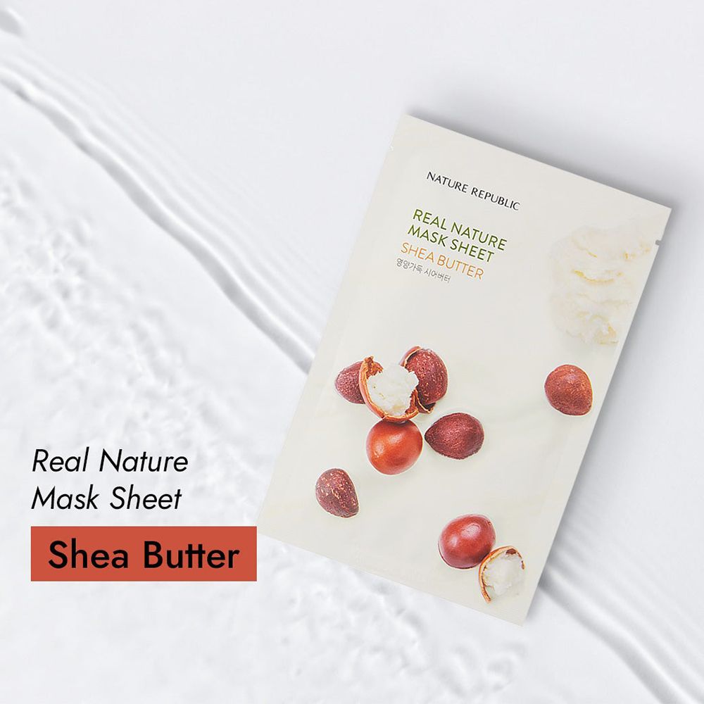 Maschera in tessuto con testo 'REAL NATURE MASK SHEET SHEA BUTTER' su sfondo bianco. Burro di karité e noci accanto.