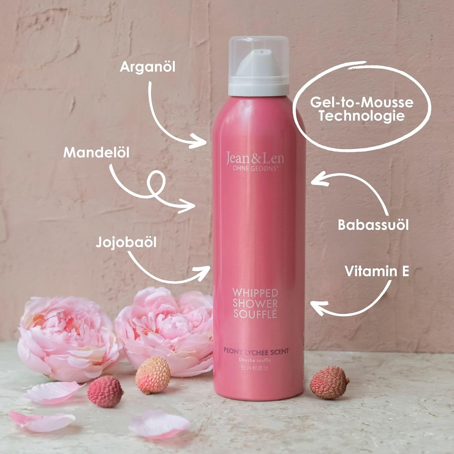 Flacone rosa Whipped Shower Soufflé di Jean & Len. Con olio di argan, mandorle, jojoba, babassu e vitamina E.