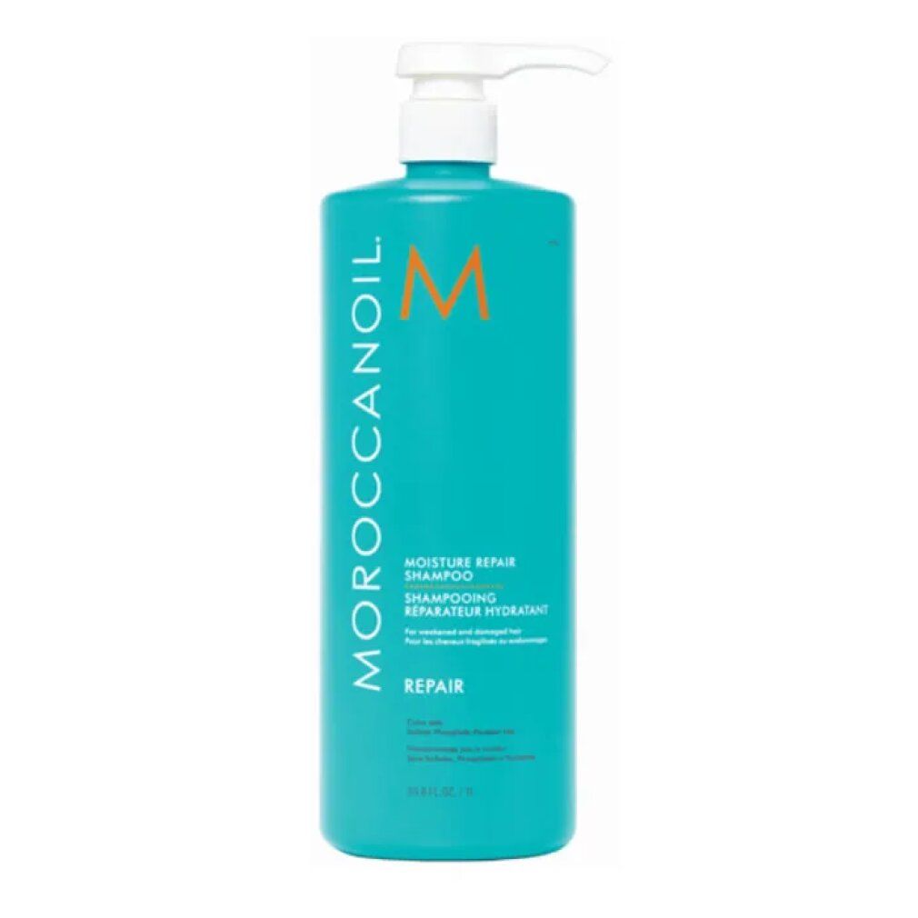 Flacone di shampoo turchese con dosatore bianco. Scritta: Moroccanoil, Moisture Repair Shampoo, Repair. Logo arancione.