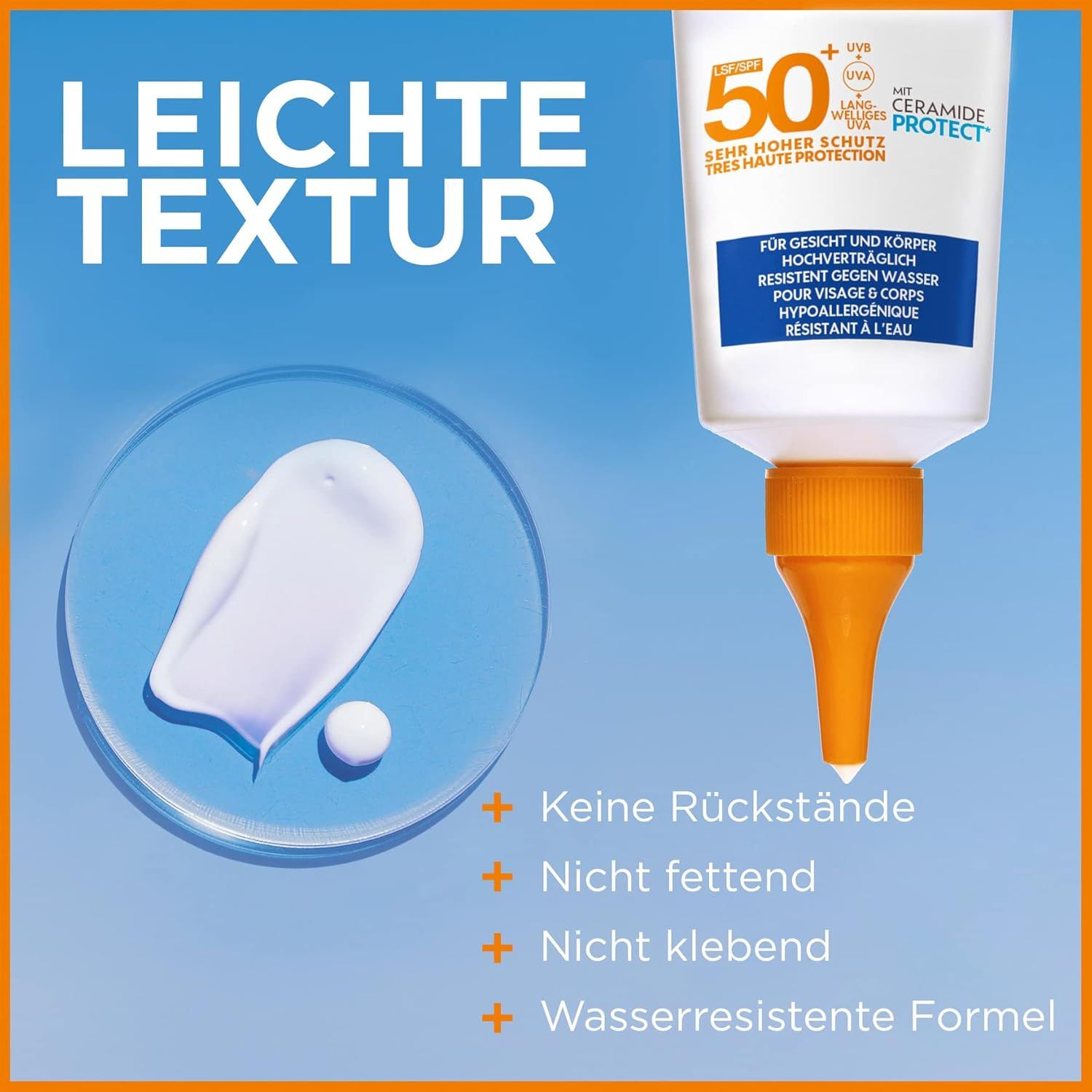 Primo piano del tubo bianco Garnier Ambre Solaire Sensitive Expert+ LSF50+ Siero. Macchia di crema. Testo: Nessun residuo, non grasso, resistente all'acqua.