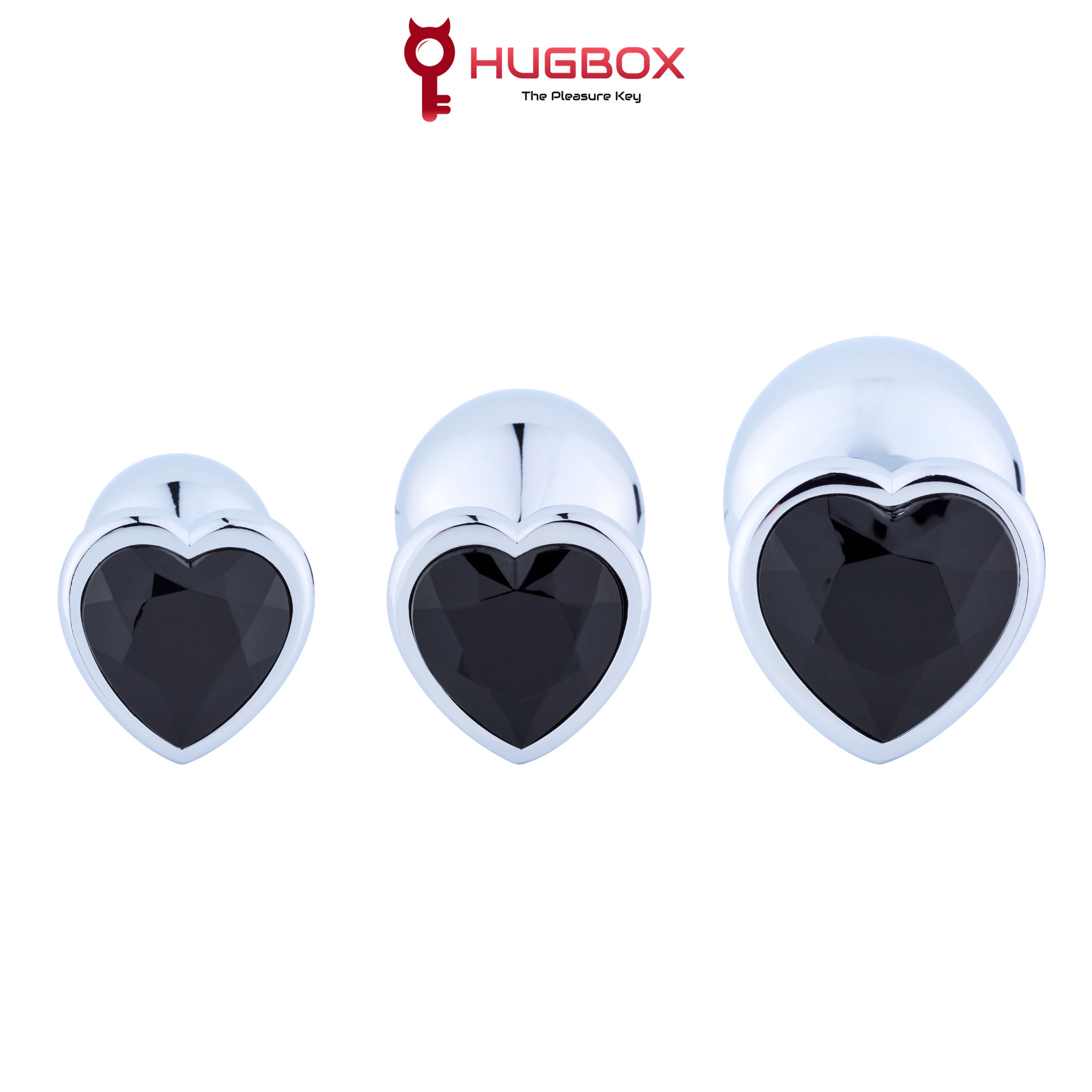 Tre plug anali con pietre nere a forma di cuore. Superficie lucida, diverse dimensioni.