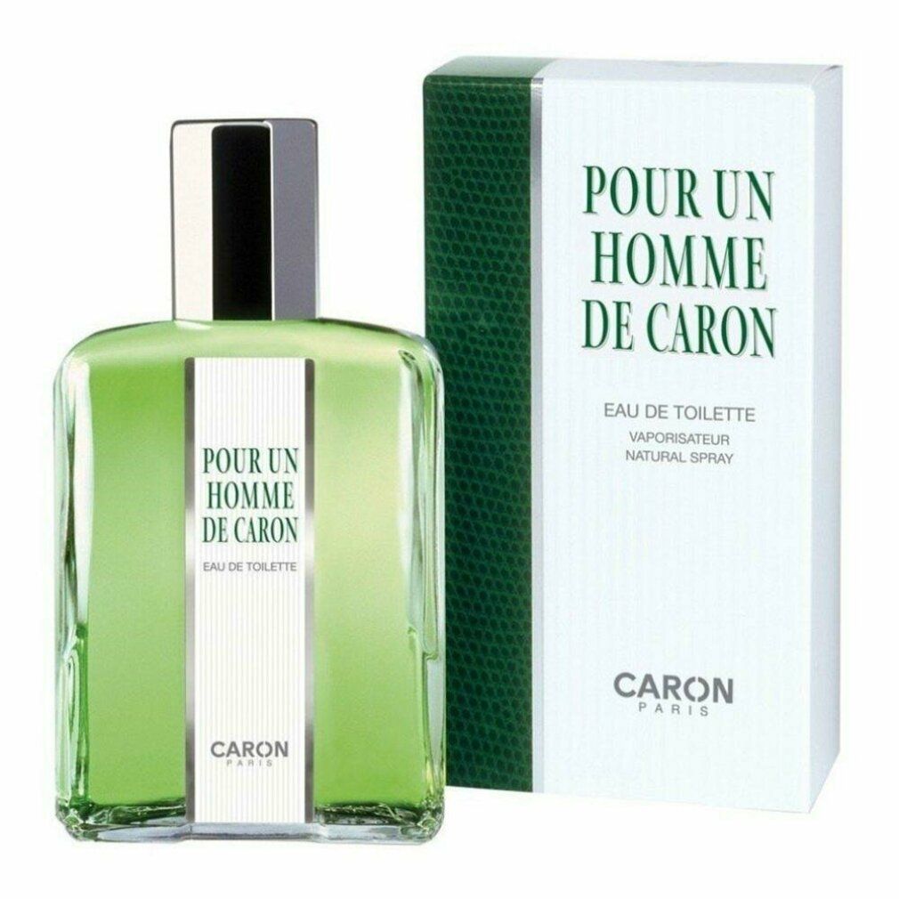 Spray Eau de Toilette verde e confezione. Scritta: Pour Un Homme de Caron, Eau de Toilette, Vaporisateur Natural Spray. Marchio Caron.