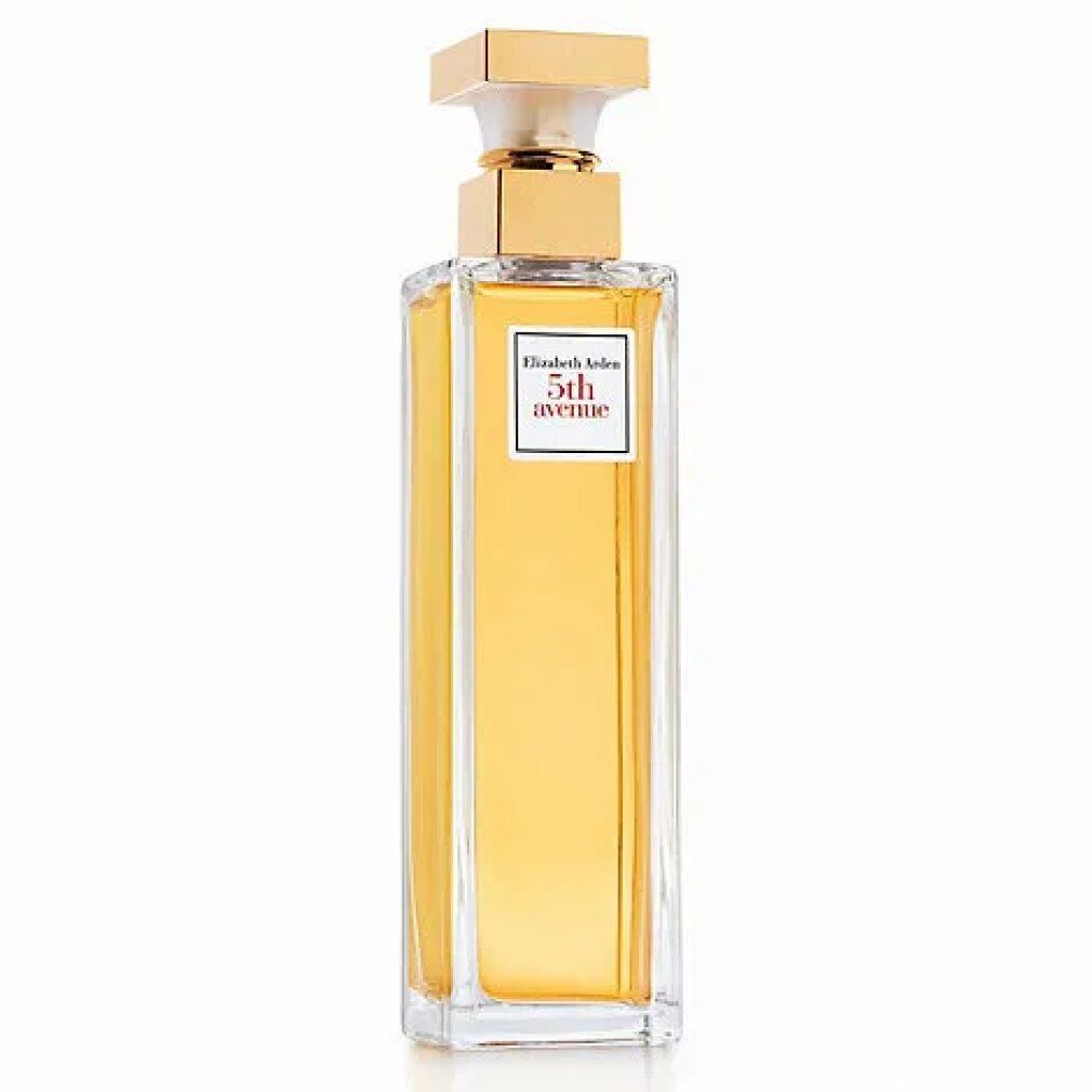 Flacone di profumo rettangolare con tappo dorato ed etichetta. Flacone in vetro trasparente con liquido giallastro.