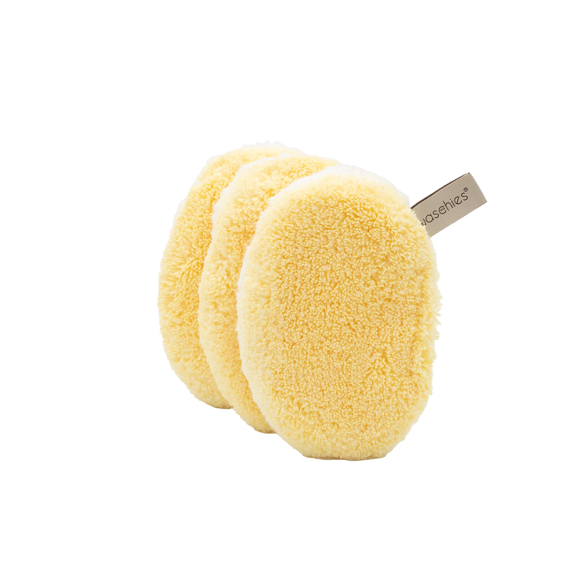 Tre dischetti struccanti gialli rotondi con un'etichetta con il logo 'waschies'.