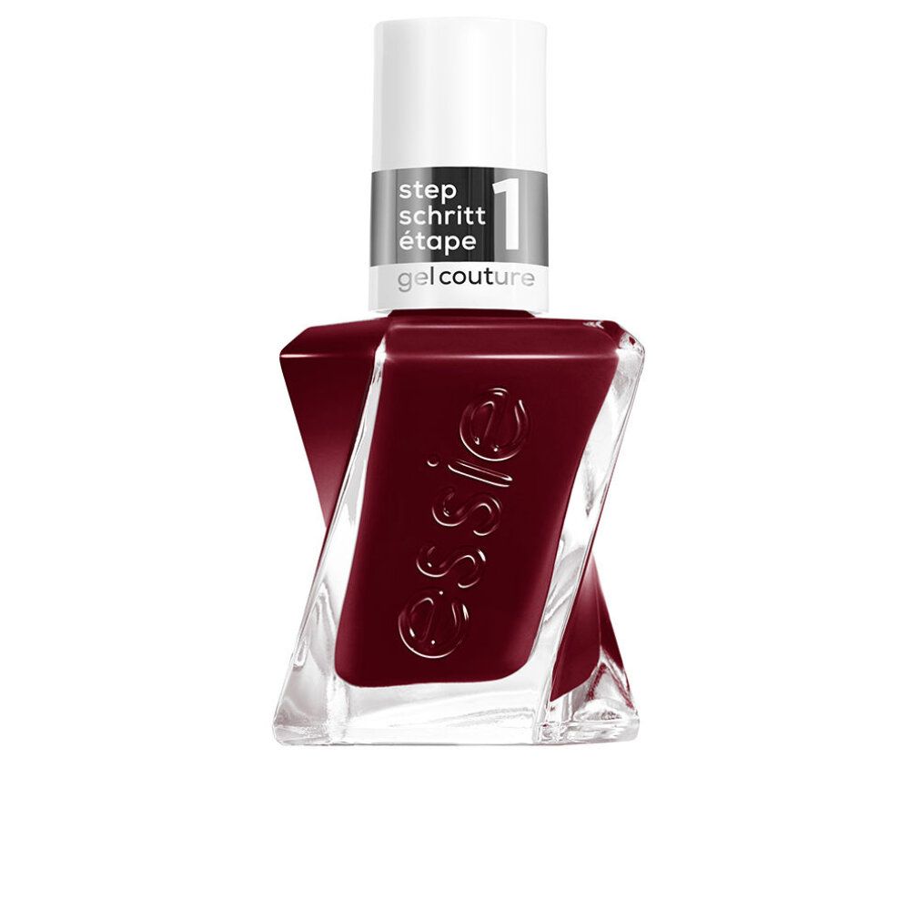 Flacone di smalto per unghie rosso scuro. Tappo bianco con fascia argentata e scritta 'gel couture'.