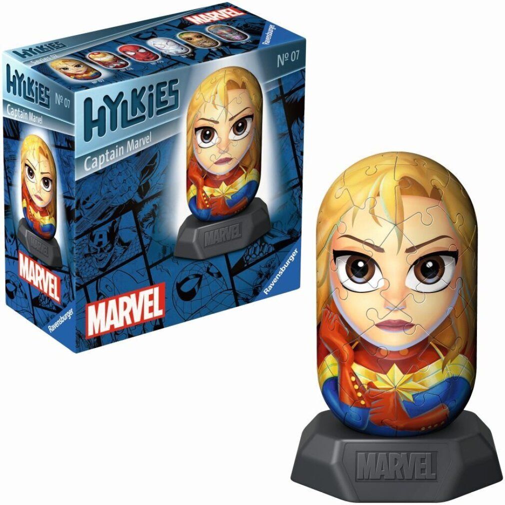 Puzzle 3D Captain Marvel Hylkies e confezione. Puzzle ovale su base. Logo Marvel. Confezione con design a fumetti.