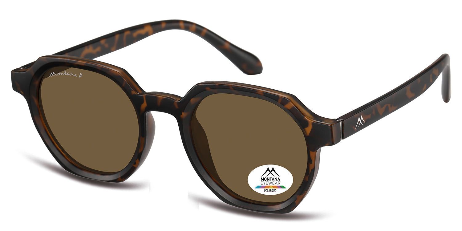 Occhiali da sole marroni con montatura marrone. Un adesivo con il logo Montana Eyewear è attaccato a una lente.