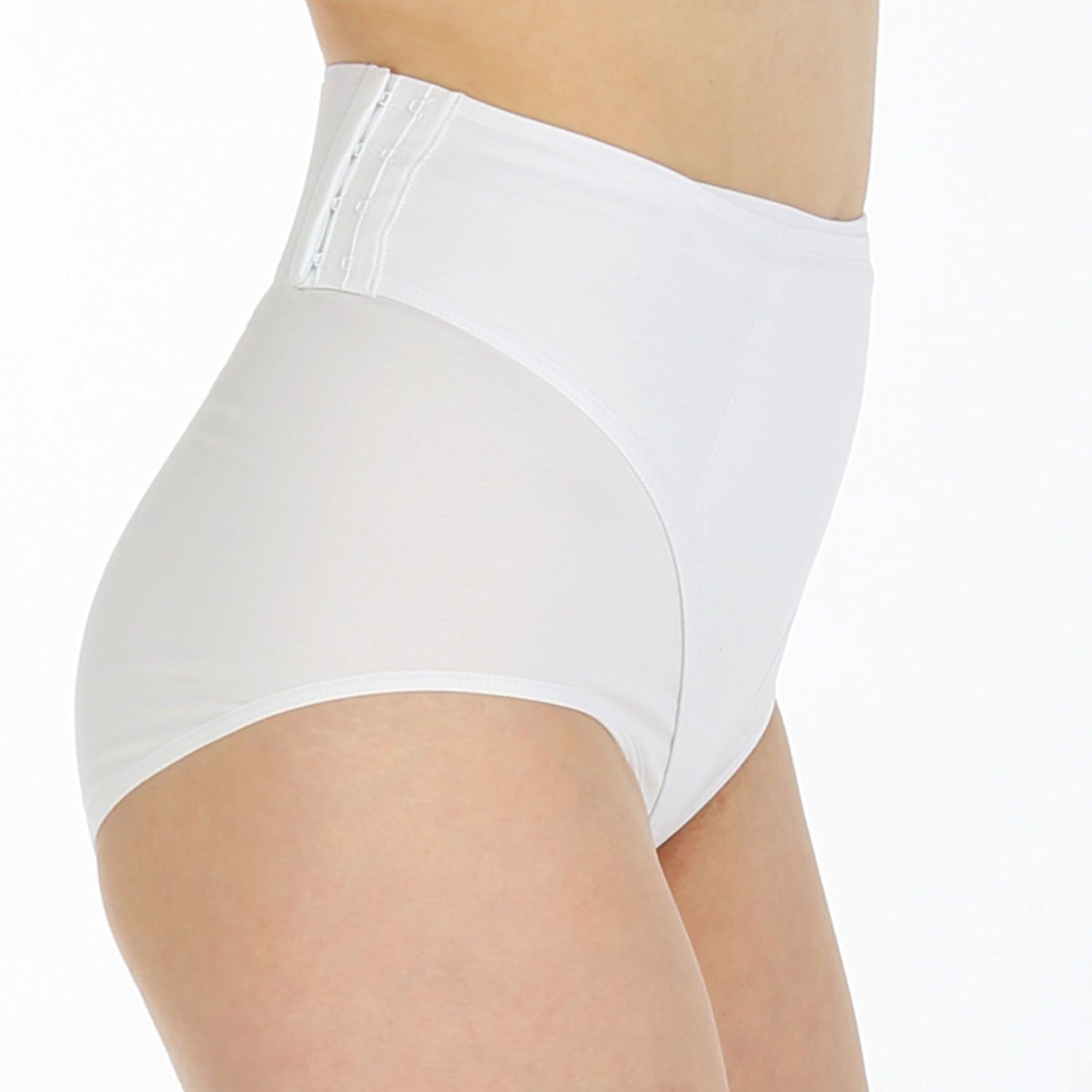 Guaina bianca, vista laterale. Chiusura a ganci, vita alta, superficie liscia.