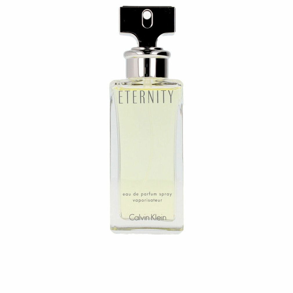 Flacone rettangolare con tappo argentato. Scritte "Eternity" e "Calvin Klein".