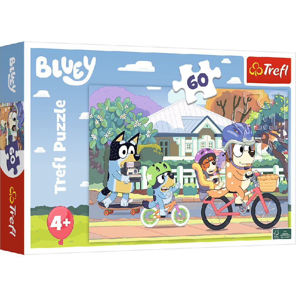 Scatola di puzzle con illustrazione di Bluey. Mostra personaggi in bicicletta e sullo skateboard. Contiene 60 pezzi, consigliato per i 4+.