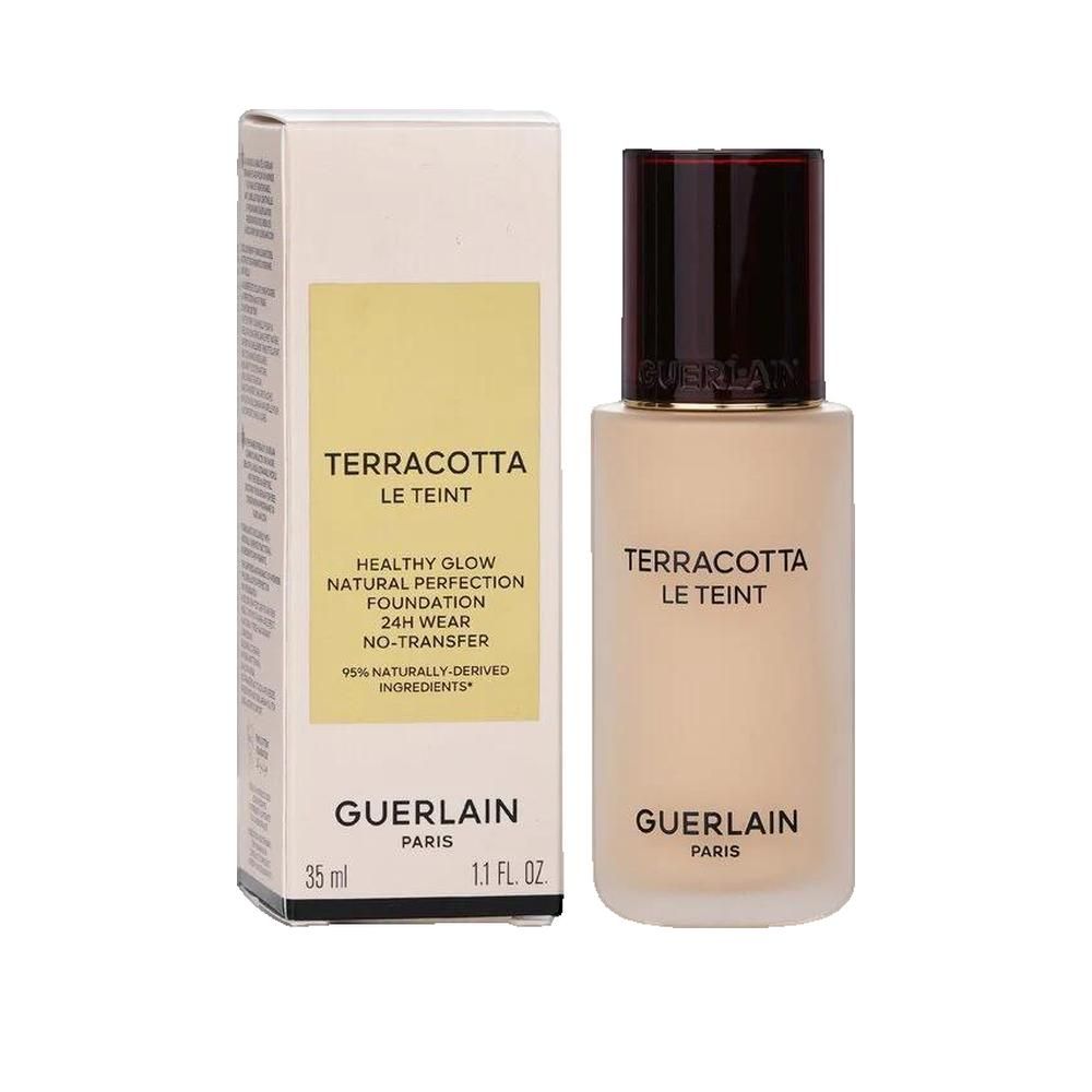 Fondotinta liquido beige e confezione. Scritta: Terracotta Le Teint, Guerlain Paris. 35 ml.