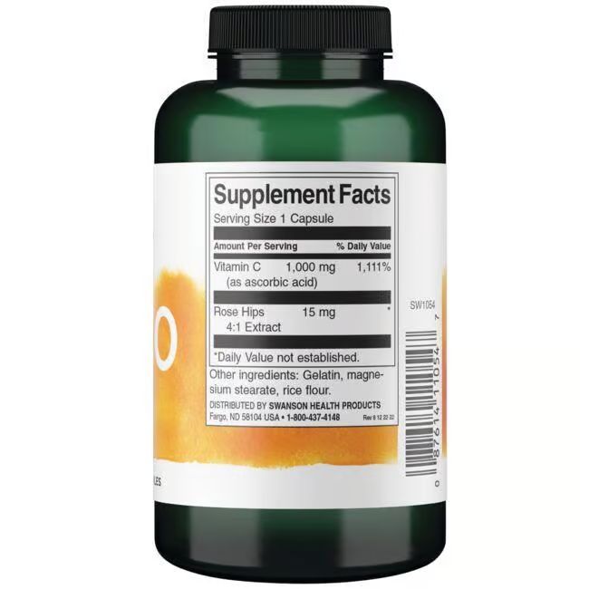 Retro di un flacone verde. Etichetta bianca con informazioni nutrizionali. Contiene vitamina C ed estratto di rosa canina.