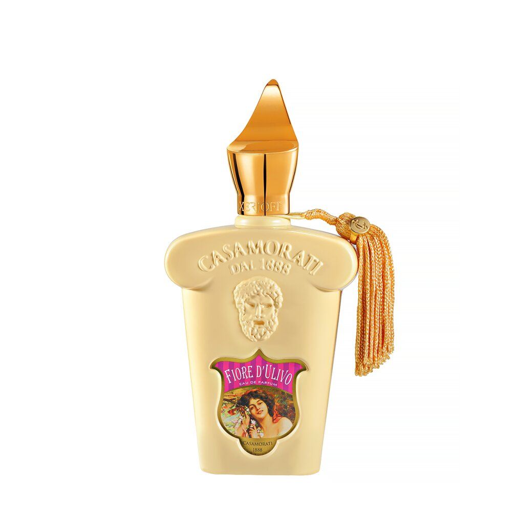 Flacone di profumo beige con tappo dorato e nappa. Scritte Fiore d'Ulivo e Casamorati.