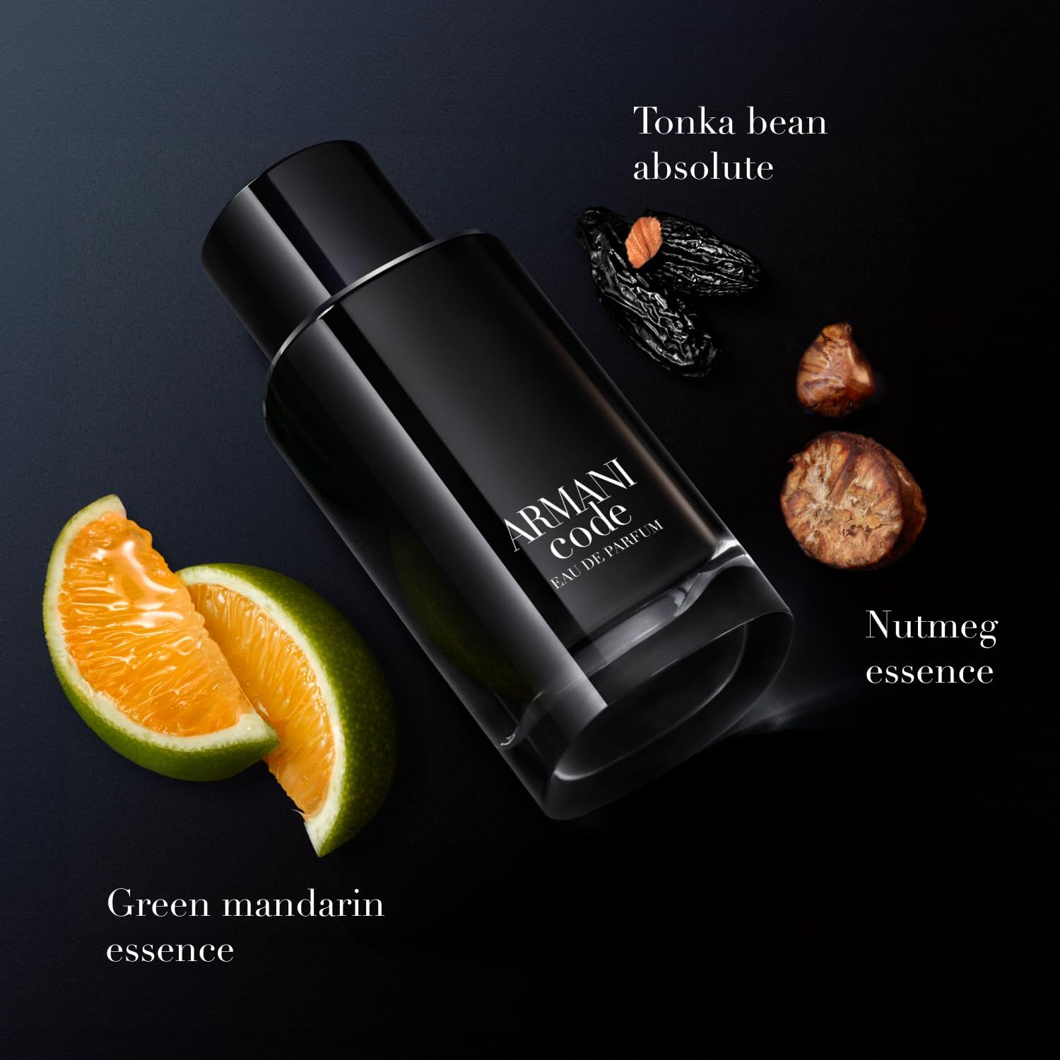 Flacone nero, accanto mandarino verde, fava tonka, noce moscata. Scritta: ARMANI CODE EAU DE PARFUM.