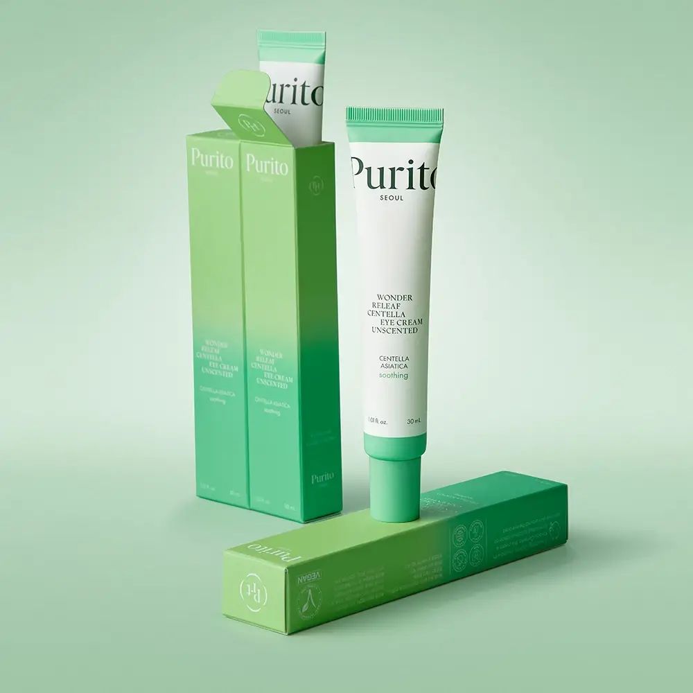 Confezione del prodotto con tubi e scatole. Il tubo è bianco con accenti verdi. Il testo recita: PURITO Wonder Releaf Centella Unscented Eye Cream.