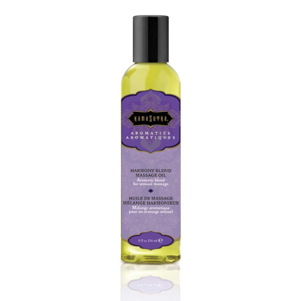 Flacone giallo con tappo nero. Etichetta viola con testo: "Kamasutra Aromatics Harmony Blend Massage Oil". 4 fl oz.