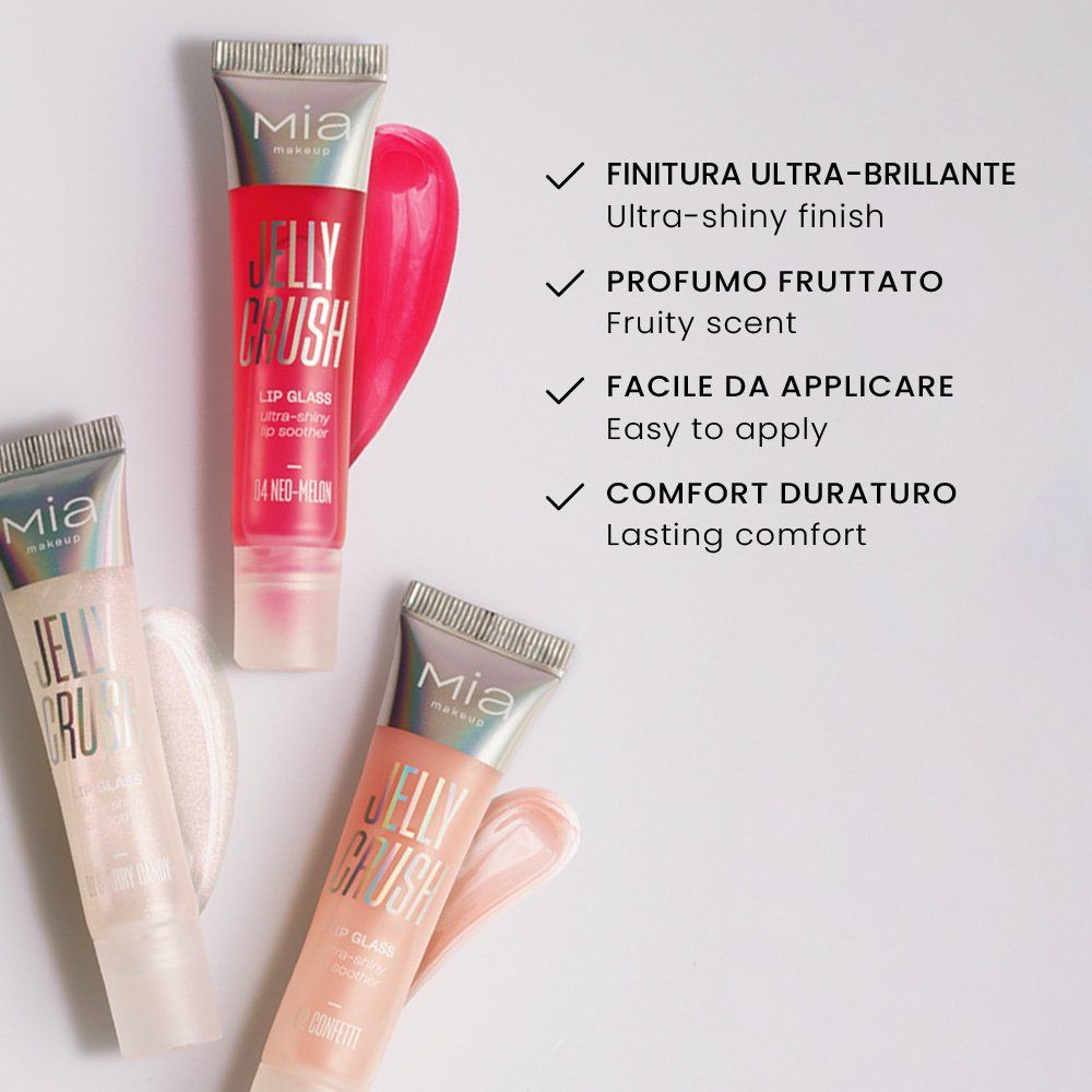 Tre tubi di lucidalabbra con campioni. Testo: Finition Ultra-brillante, Profumo Fruttato, Facile da applicare, Comfort Duraturo.