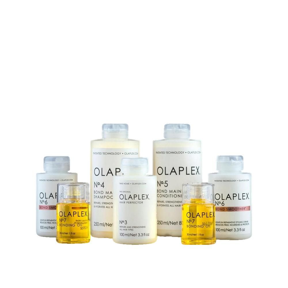 Diverse bottiglie e flaconi. Scritta OLAPLEX, n. 3, 4, 5, 6, 7. Shampoo, balsamo e olio. Confezione bianca.