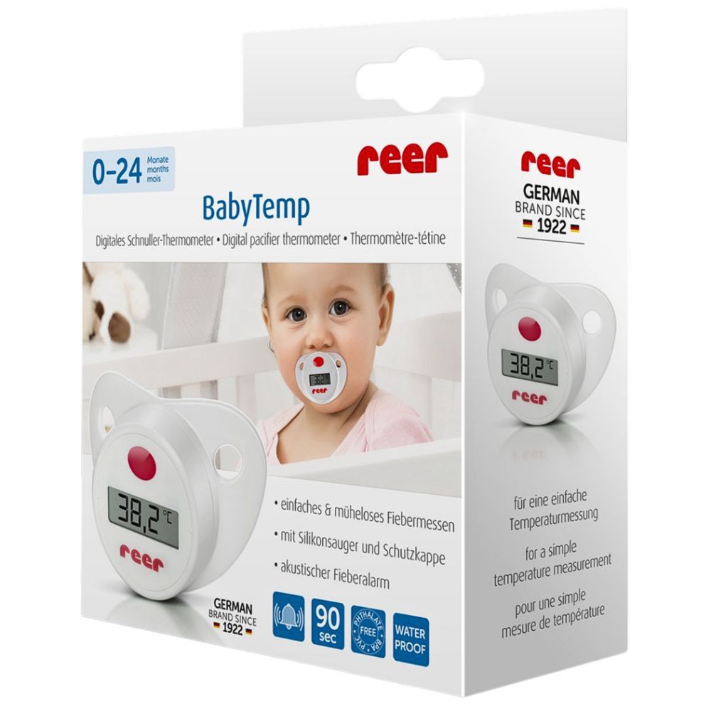 Confezione per termometro a ciuccio BabyTemp. Prodotto e bambino in culla illustrati. Marchio: reer.