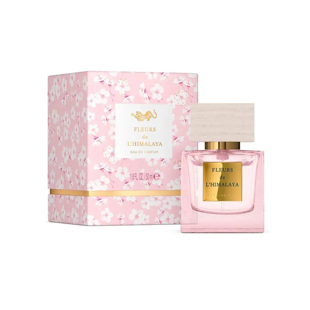 Flacone rosa e scatola rosa con decorazioni floreali. Scritta: Fleurs de L'Himalaya Eau de Parfum. Tappo in legno.