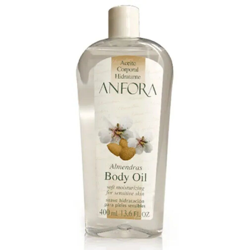 Olio corpo in bottiglia trasparente. Etichetta con ANFORA, Aceite Corporal Hidratante, Almendras Body Oil. 400 ml, 13.6 FL OZ.
