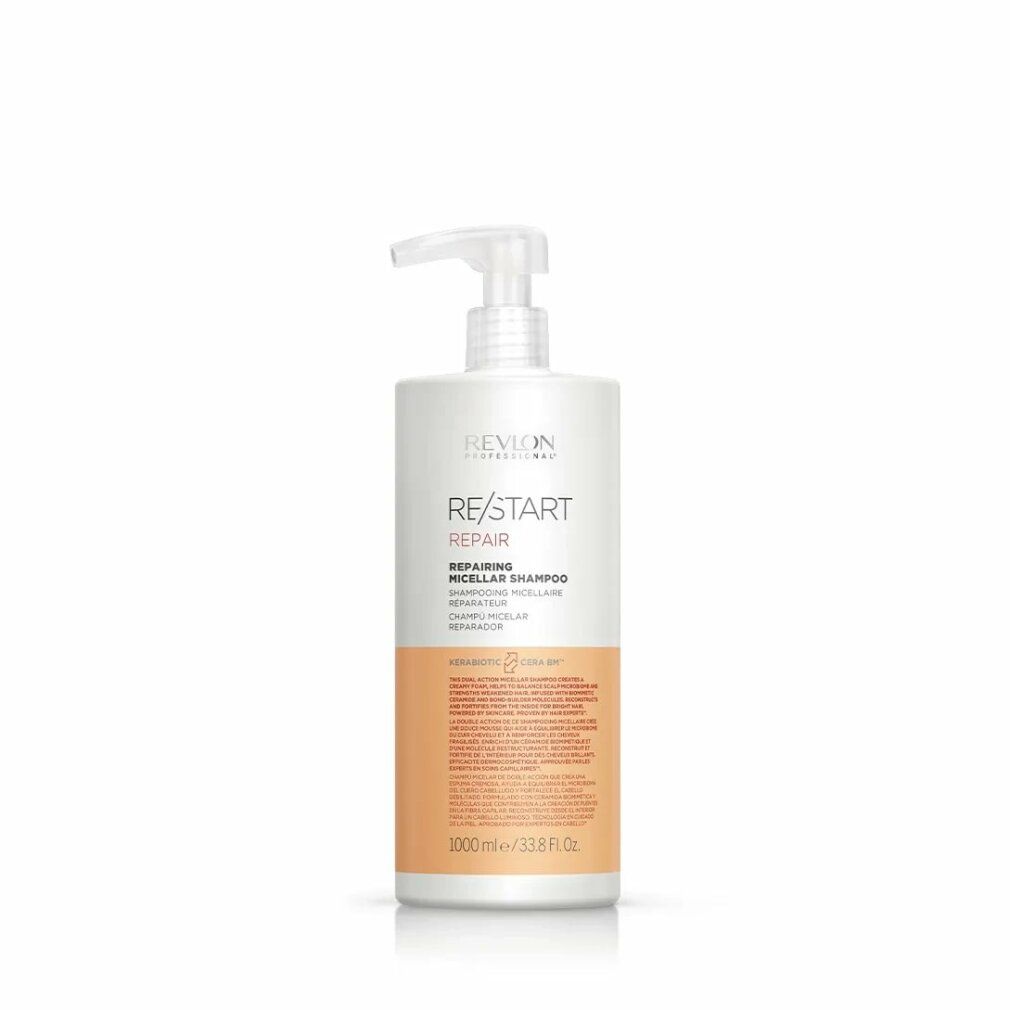 Flacone di shampoo bianco con pompa e scritta RE/START REPAIR. Striscia arancione con testo. 1000 ml/33.8 Fl. Oz.