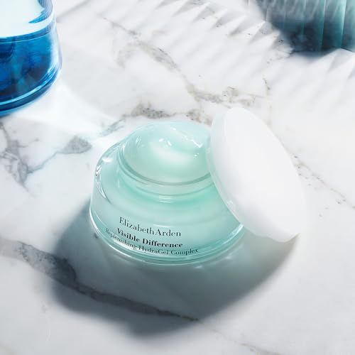 Elizabeth Arden Visible Difference Replenishing HydraGel Complex su superficie marmorizzata, coperchio accanto.