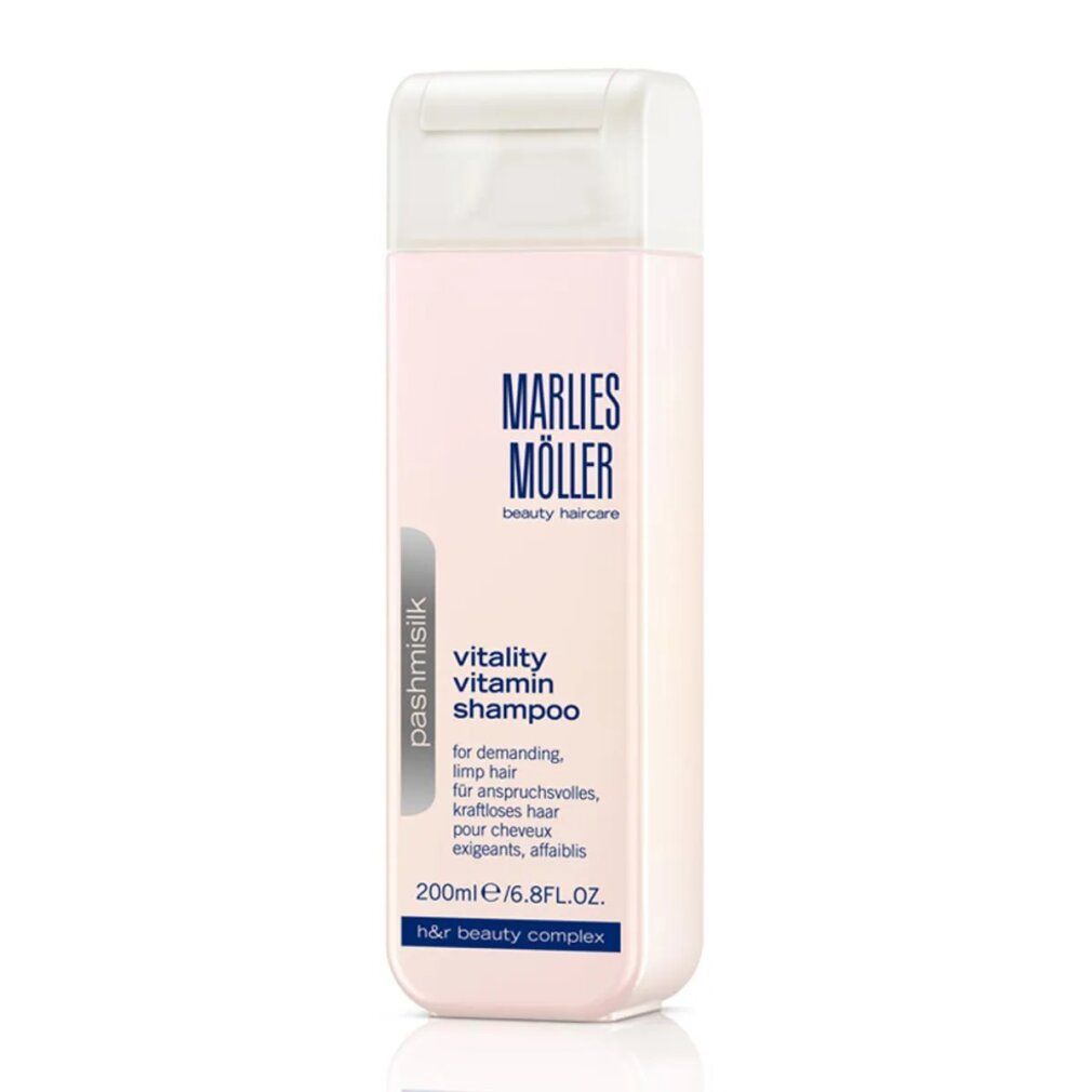 Flacone rosa con tappo bianco. Scritta: Marlies Möller, Pashmisilk Vitality Vitamin Shampoo. 200ml/6.8FL.OZ.