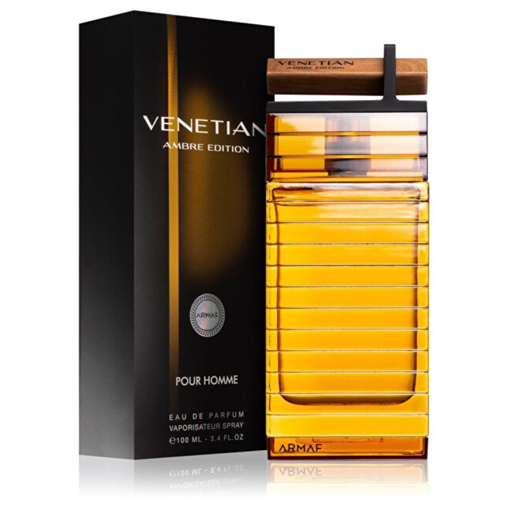 Flacone di profumo e confezione. Flacone rettangolare ambrato con tappo in legno. Confezione nera con testo dorato: Venetian Ambre Edition.