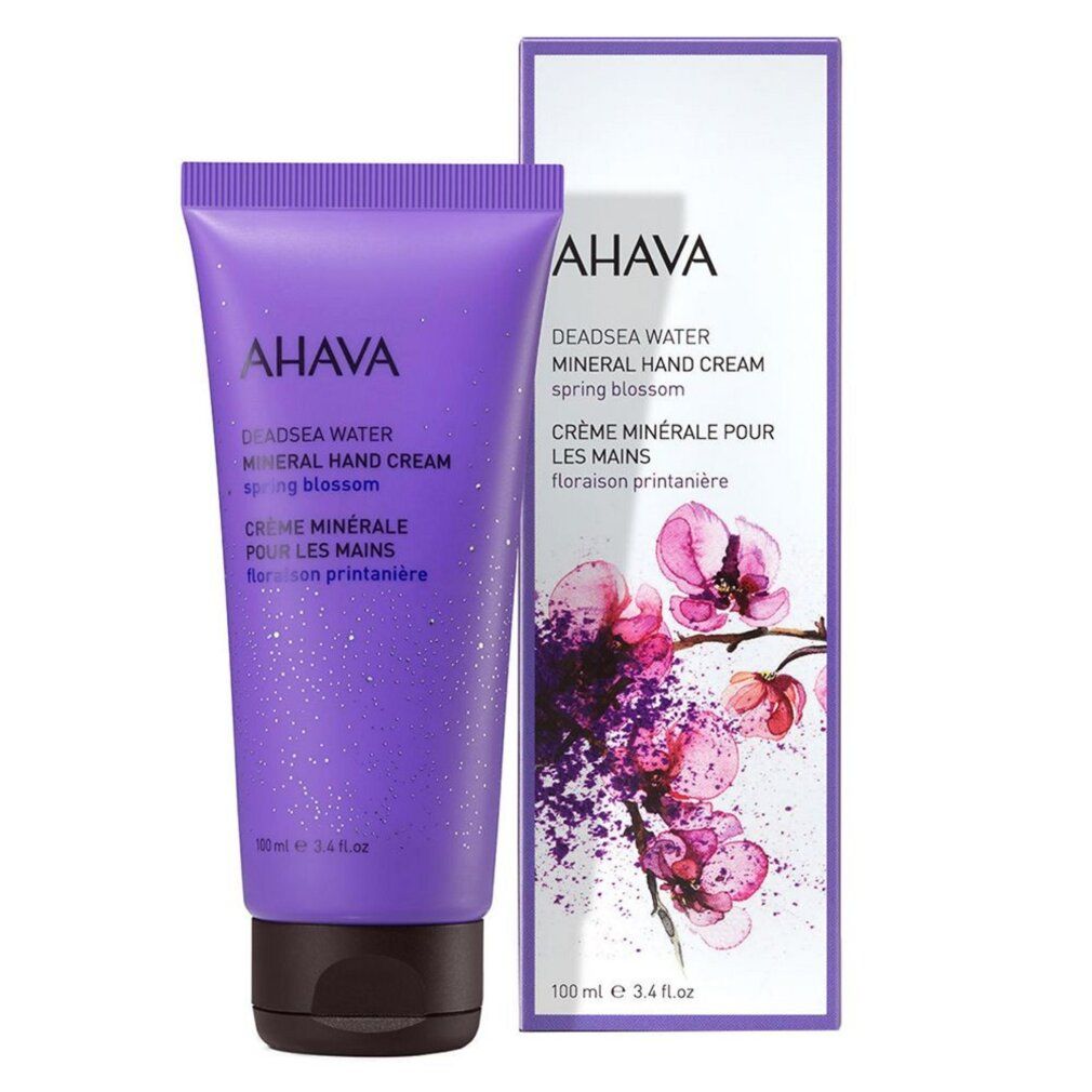 Tubo e scatola AHAVA Mineral Hand Cream con fiori.