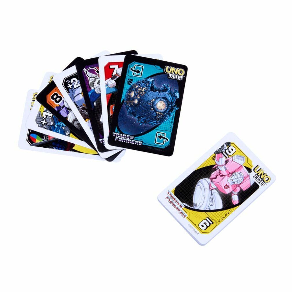 Carte UNO Flip! Transformers. Carte con numeri e personaggi. Una carta è separata dalle altre.
