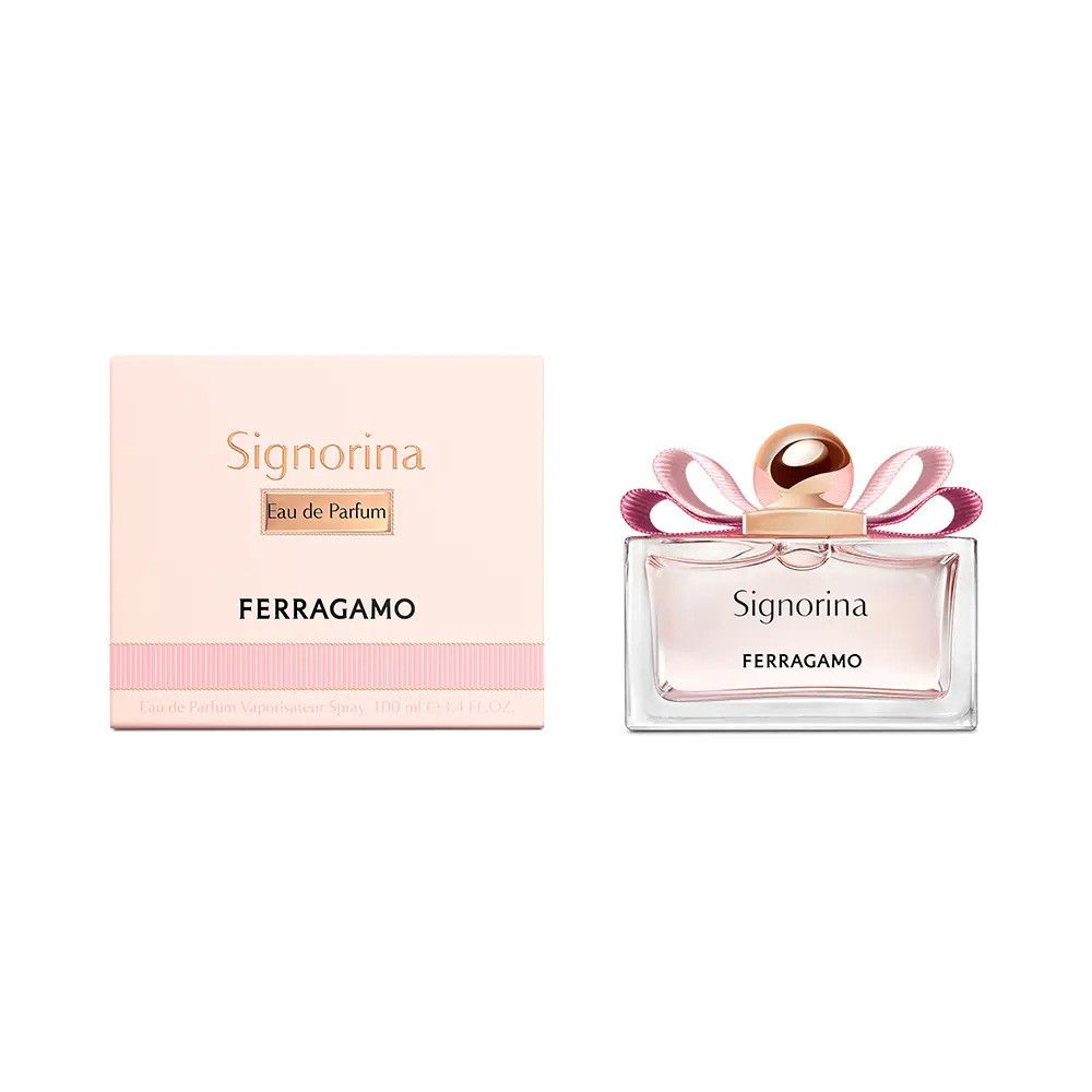 Signorina Eau de Parfum di Ferragamo. Flacone rettangolare con liquido rosa, fiocco rosa e tappo dorato. Confezione rosa.