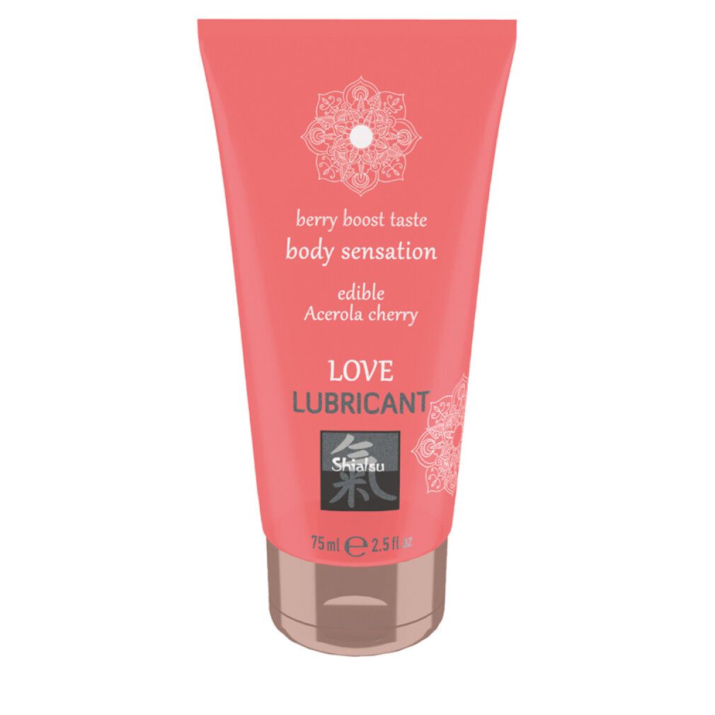 Tubo rosa con testo bianco. Contiene 'LOVE LUBRICANT', 'berry boost taste', 'edible Acerola cherry'. Marchio: Shiatsu.