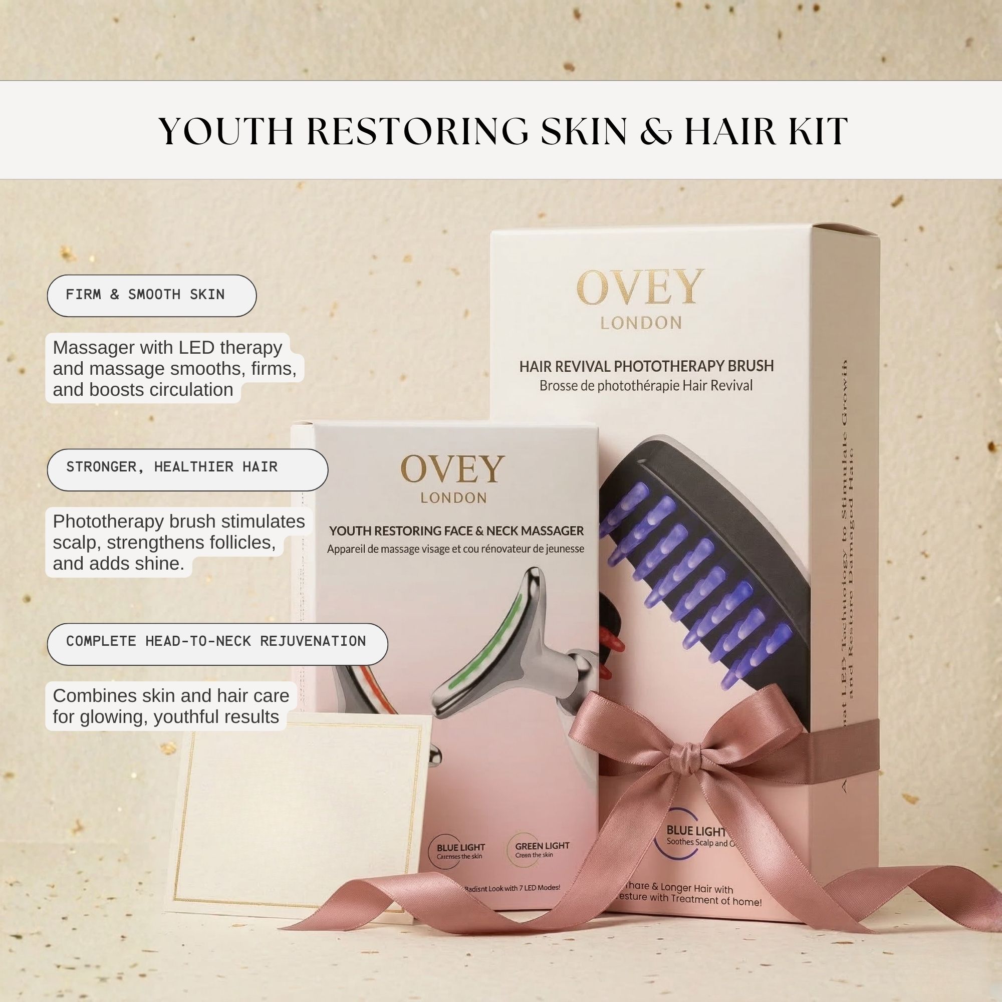 Set di prodotti con massaggiatore e spazzola per capelli in una scatola. Testo: OVEY LONDON. Fiocco rosa. Campi di testo con info.