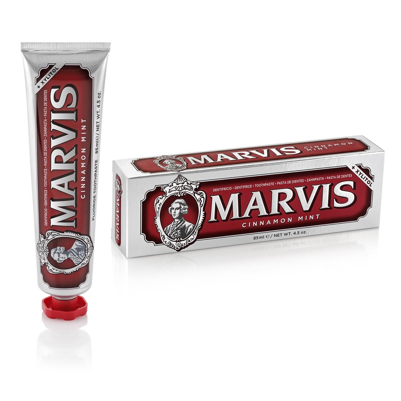 Tubo e scatola di dentifricio MARVIS CINNAMON MINT. Tubo con tappo rosso. Scatola bianca/rossa.