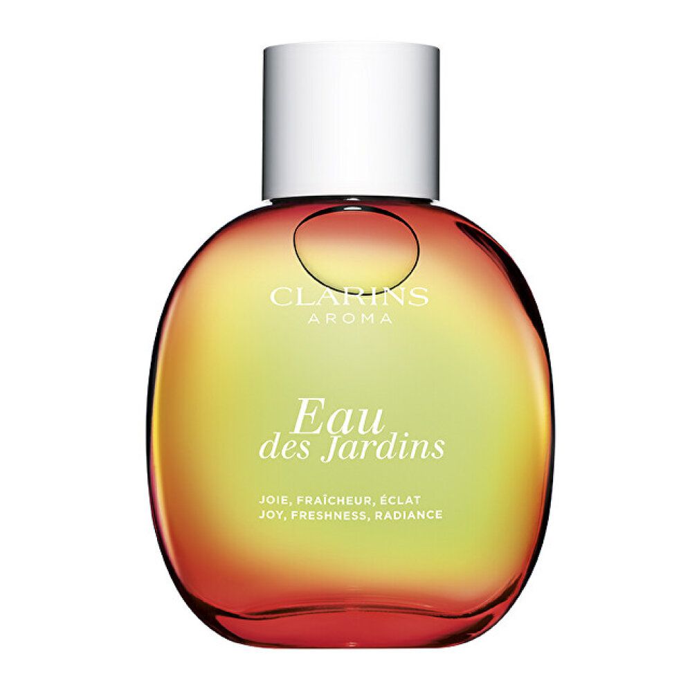Flacone rotondo con tappo bianco. Scritta: Eau des Jardins, Clarins Aroma. Sfumatura giallo-rossa.