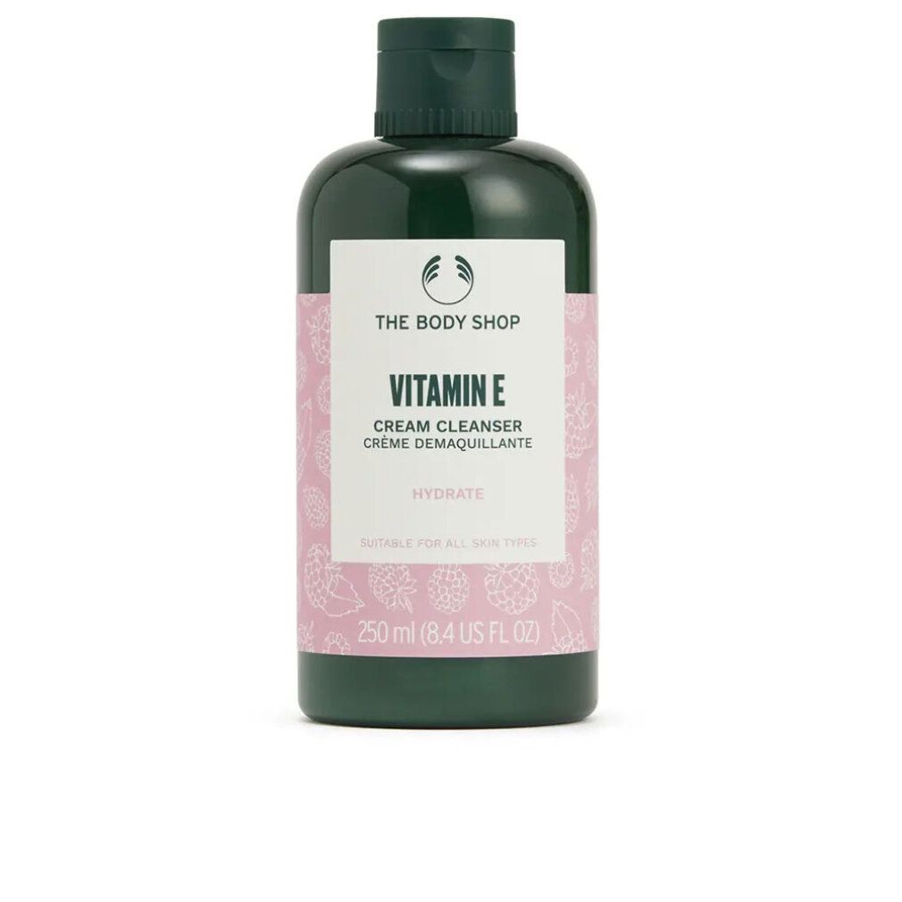 Flacone verde con etichetta bianca. Scritta: Vitamin E Cream Cleanser. Adatto a tutti i tipi di pelle. 250 ml.