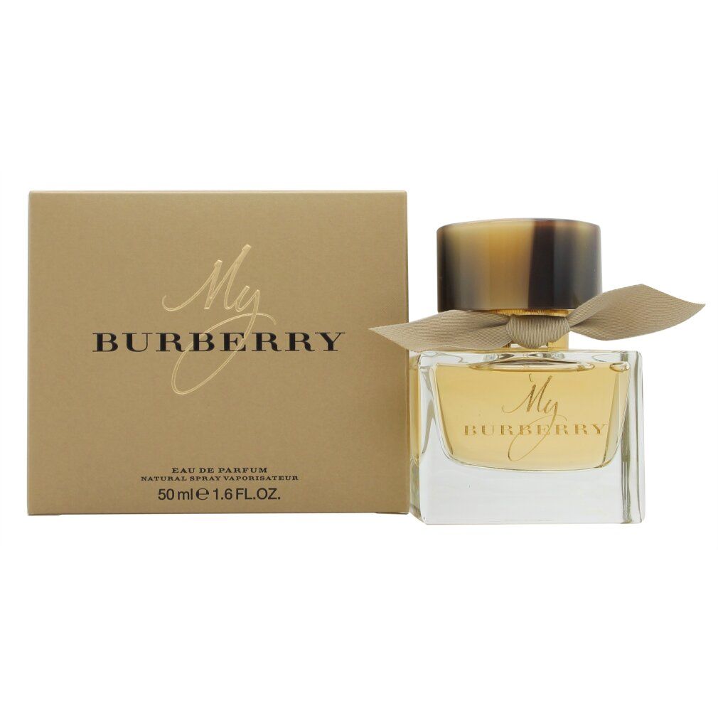 Flacone di profumo e scatola. Flacone con tappo dorato e fiocco. Sulla scatola è scritto My Burberry.