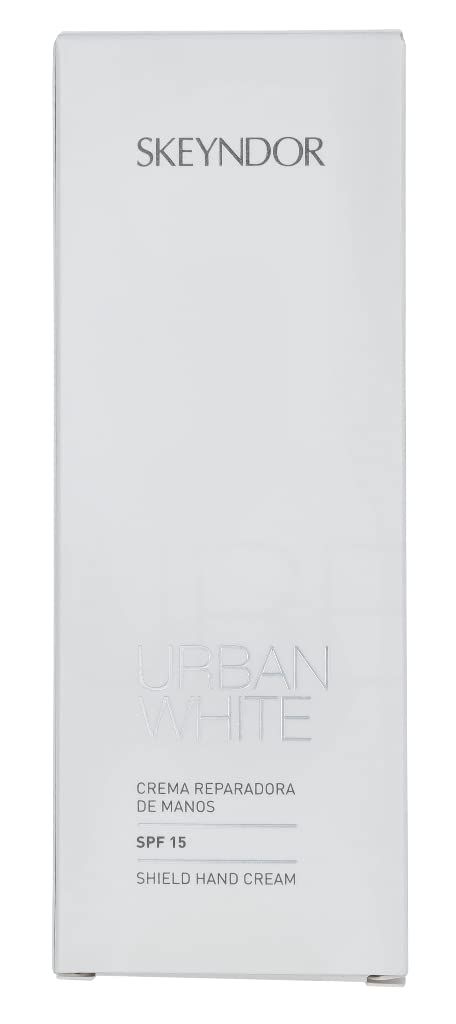 Scatola bianca Skeyndor. Testo: Urban White, Crema Reparadora de Manos, SPF 15, Shield Hand Cream. Forma rettangolare.