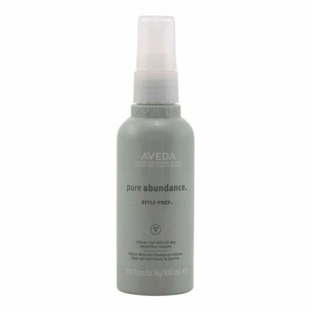 Flacone grigio con vaporizzatore bianco. Scritta: Aveda, pure abundance, Style-Prep. Testo: Infuse hair with all-day weightless volume.