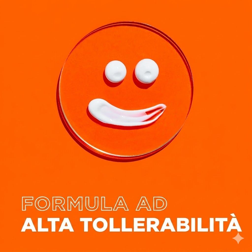 Sfondo arancione con smiley di crema. Testo: Formula ad alta tollerabilità.