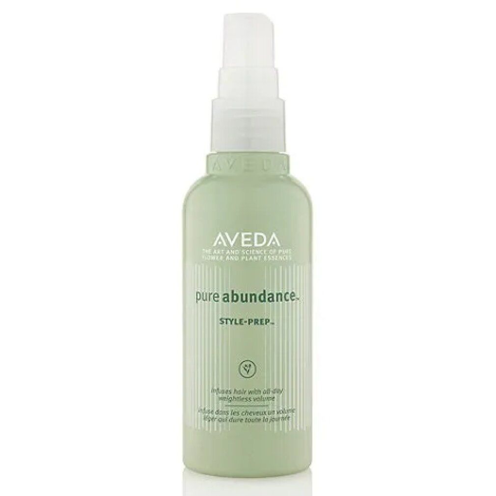 Flacone verde con vaporizzatore bianco. Scritta: Aveda, pure abundance, Style-Prep. Testo: Infuse hair with all-day weightless volume.
