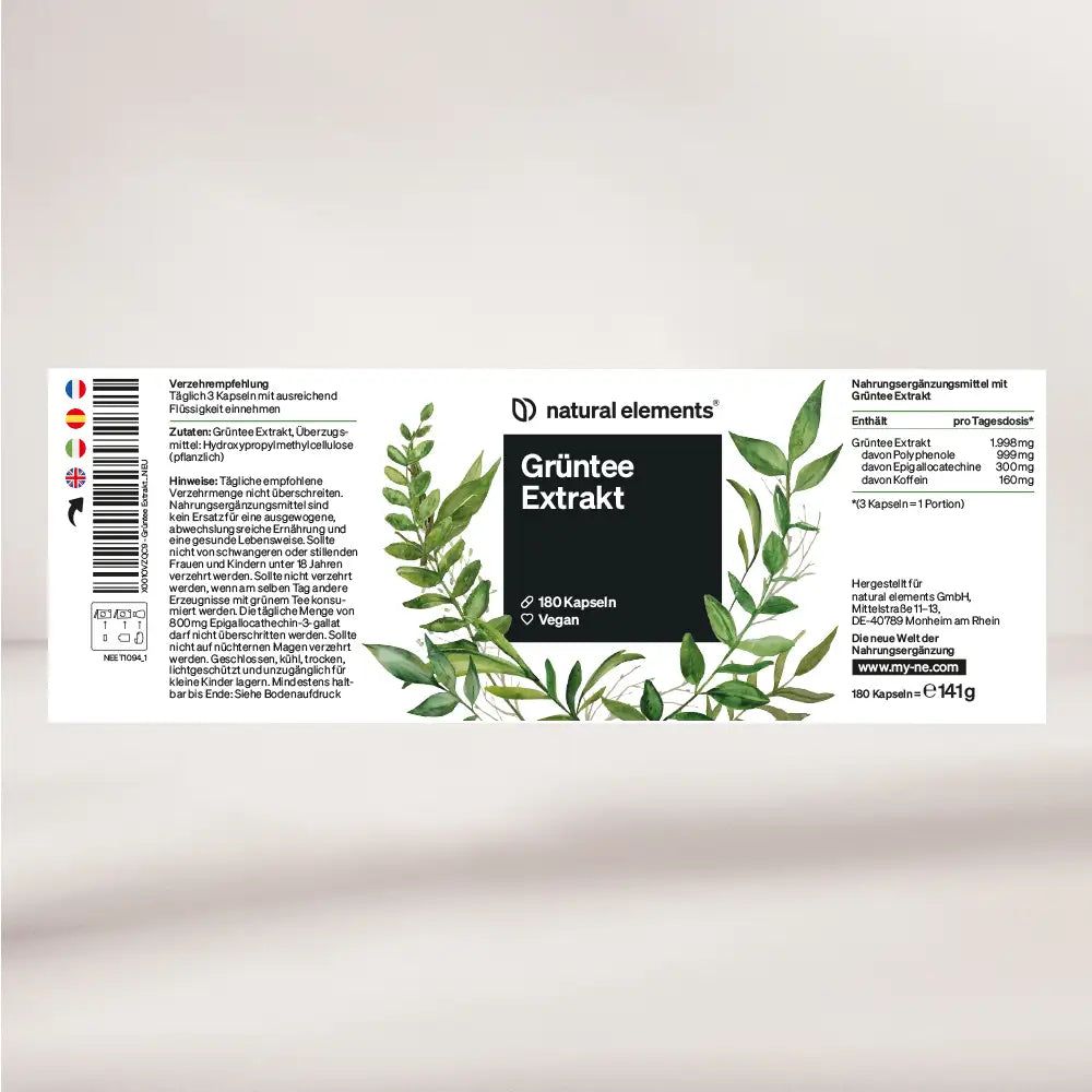 Etichetta del prodotto con testo e foglie. Contiene informazioni sull'estratto di tè verde, 180 capsule, vegano. Contiene informazioni nutrizionali.