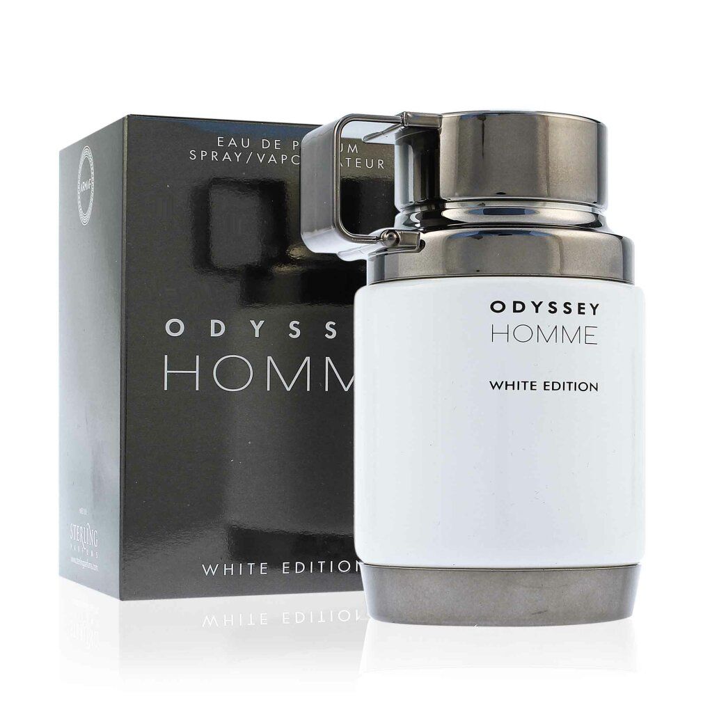 Flacone bianco con tappo e manico neri, accanto a una scatola nera. Scritta: Odyssey Homme White Edition. Eau de Parfum Spray.