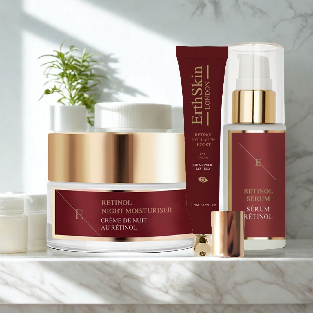Tre prodotti cosmetici: crema idratante notte al retinolo, crema occhi e siero. Confezione rossa e oro. Logo ErthSkin London.