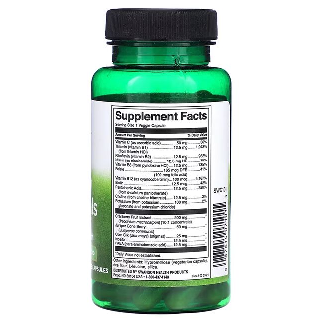 Retro di una bottiglia verde. Etichetta con informazioni nutrizionali e ingredienti. Contiene estratto di mirtillo rosso e ginepro.