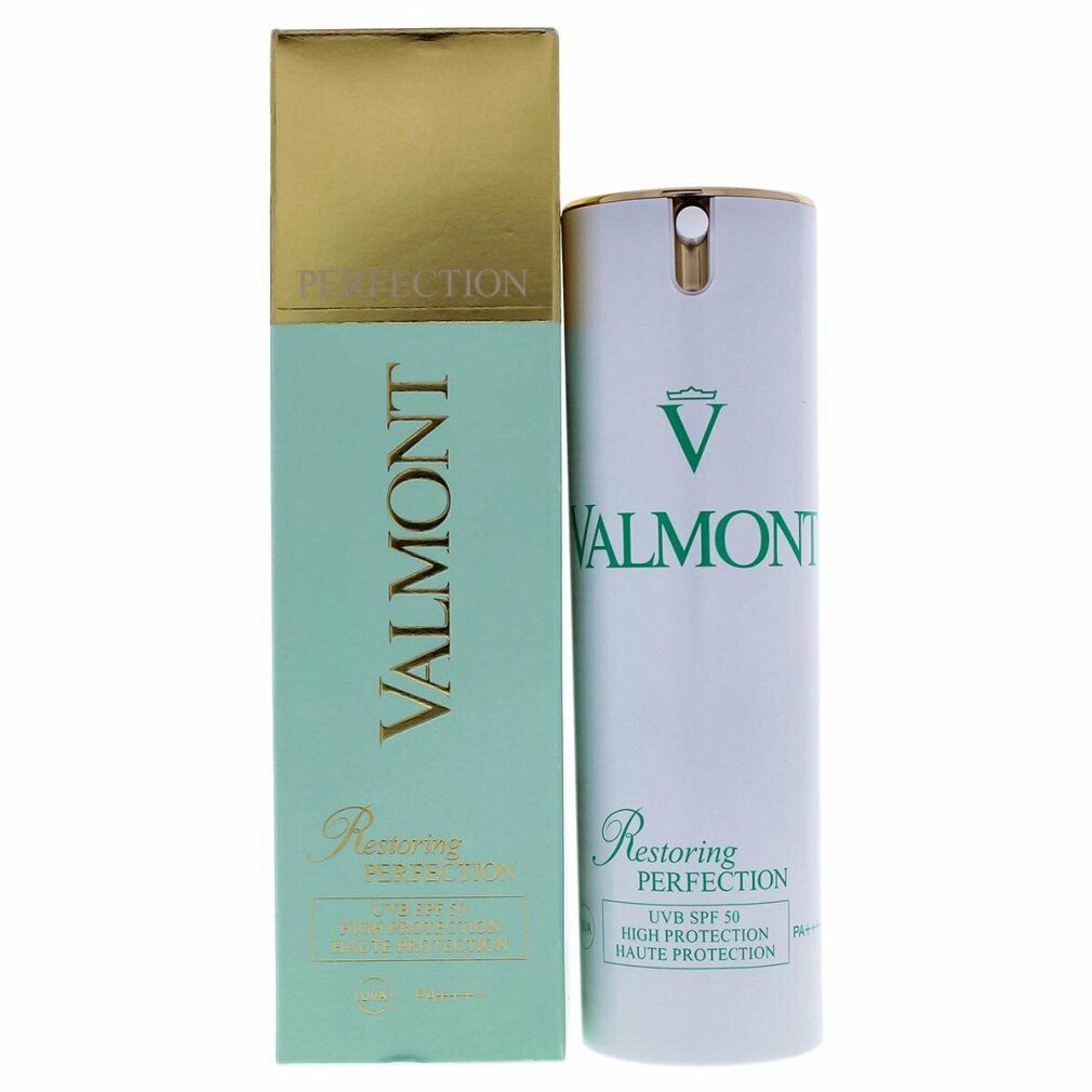 Cilindro bianco e scatola rettangolare. Dettagli dorati. Scritta: VALMONT, Restoring Perfection, SPF 50.