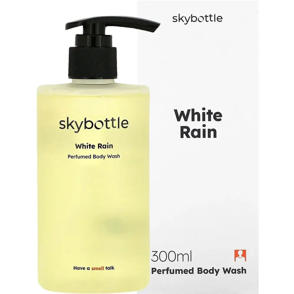 Flacone di gel doccia SKYBOTTLE White Rain con dosatore nero, accanto a confezione bianca.