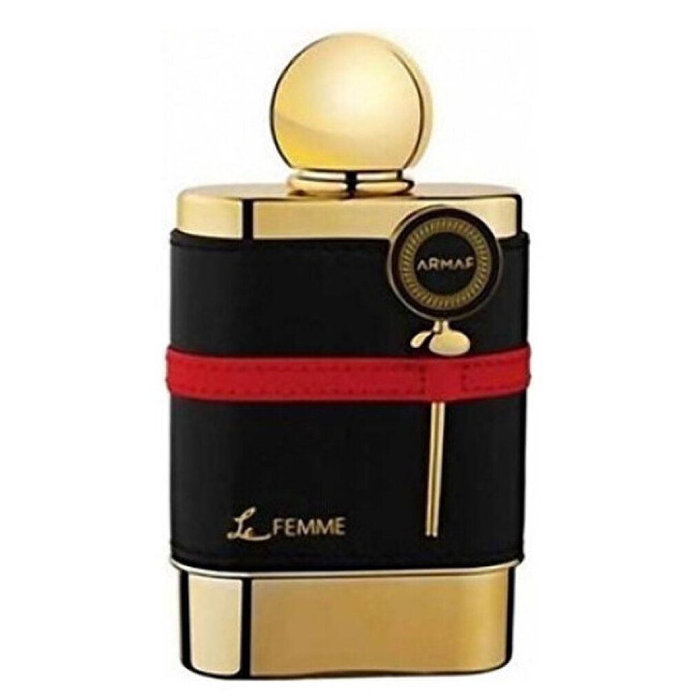 Flacone dorato con fascia in pelle nera e striscia rossa. Scritta: Le Femme Eau de Parfum. Tappo dorato.